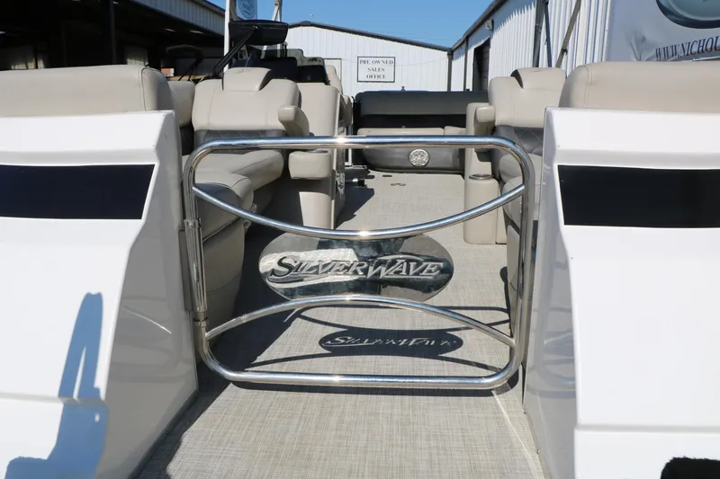 Slide: The Image of 2020 Silver Wave 2210 SW5 L pontoon boat interior with seating and branded gate. - 19