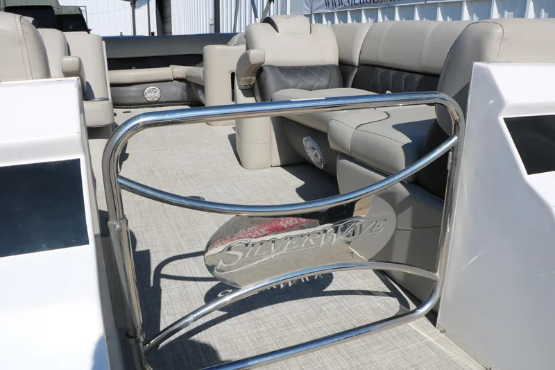 Slide: The Image of Interior view of a 2020 Silver Wave 2210 SW5 L pontoon boat with plush seating. - 20