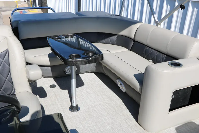Slide: The Image of Interior of 2020 Silver Wave 2210 SW5 L pontoon boat with seating and table. - 22