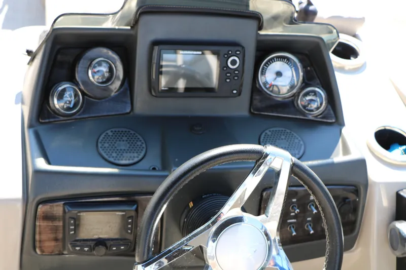 Slide: The Image of Steering console of 2020 Silver Wave 2210 SW5 L boat with gauges and controls. - 32