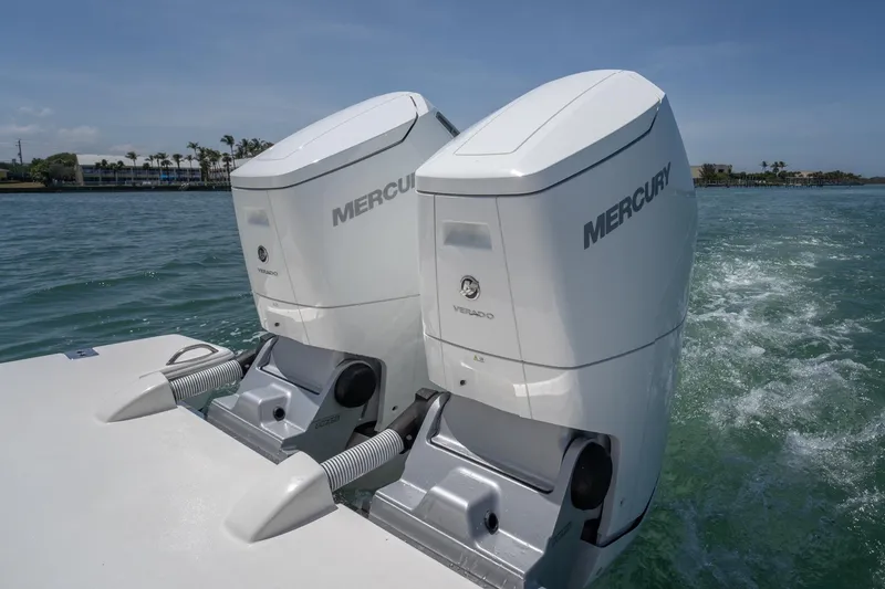 Slide: The Image of 2024 Tiara Yachts 43 LS with dual Mercury Verado outboard engines on water. - 21