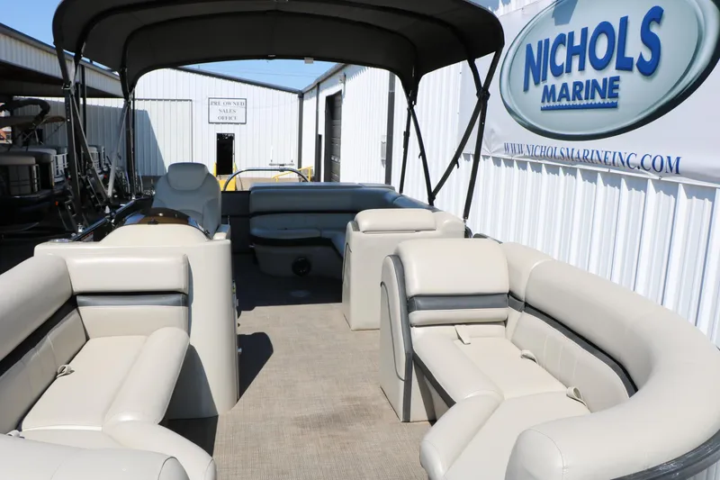 Slide: The Image of 2019 Berkshire 22CL CTS pontoon boat with beige seating at Nichols Marine. - 21