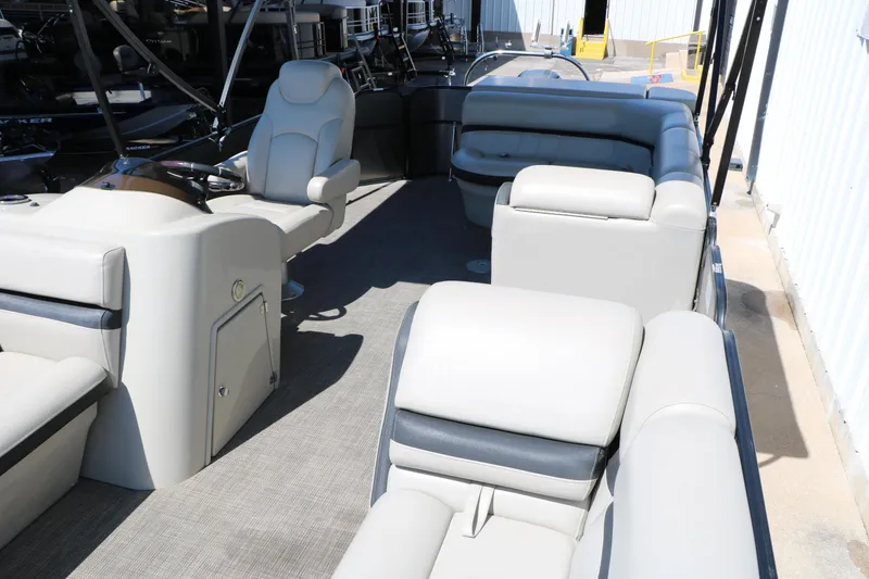 Slide: The Image of Interior of a 2019 Berkshire 22CL CTS pontoon boat with plush seating. - 22