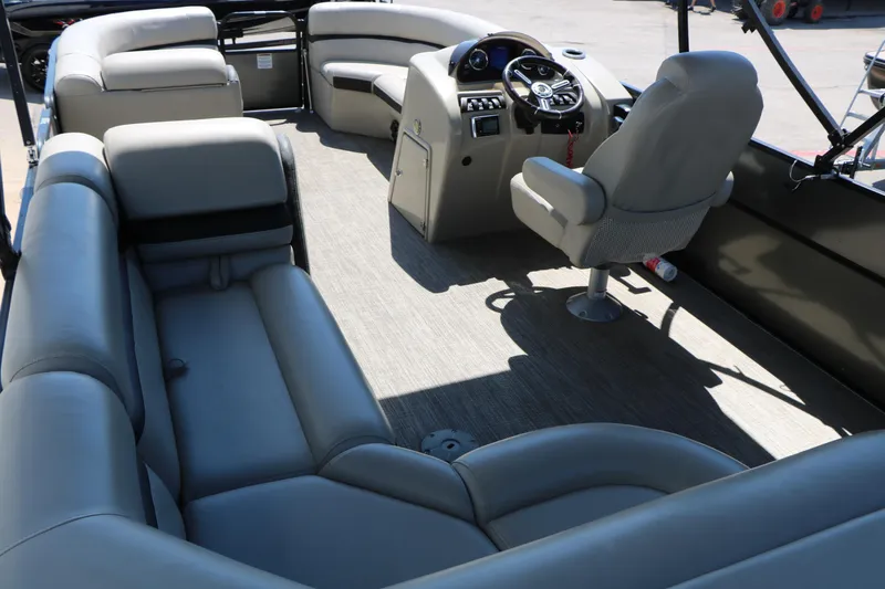 Slide: The Image of Interior of a 2019 Berkshire 22CL CTS pontoon boat with spacious seating and helm. - 24