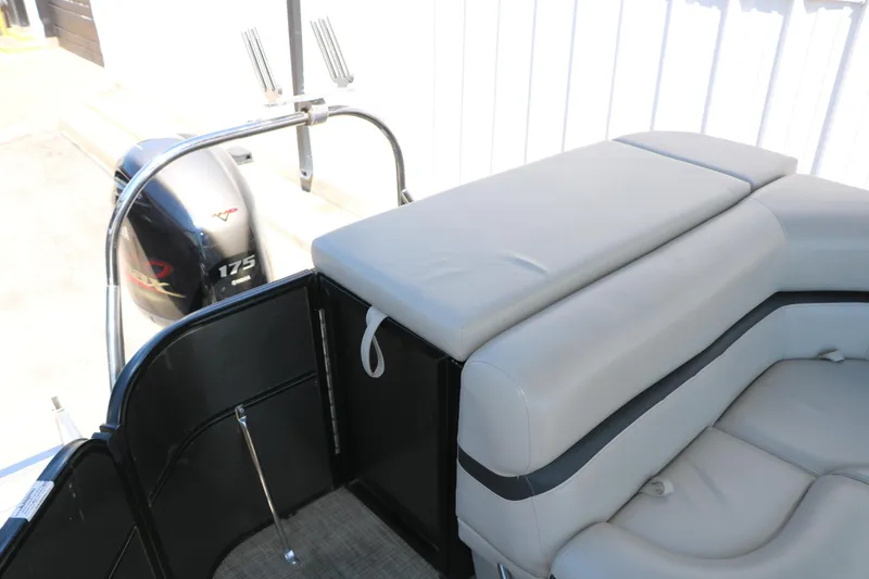 Slide: The Image of 2019 Berkshire 22CL CTS boat interior with seating and outboard motor. - 40