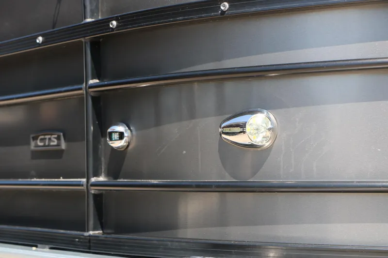 Slide: The Image of 2019 Berkshire 22CL CTS boat exterior with chrome details and CTS emblem. - 42