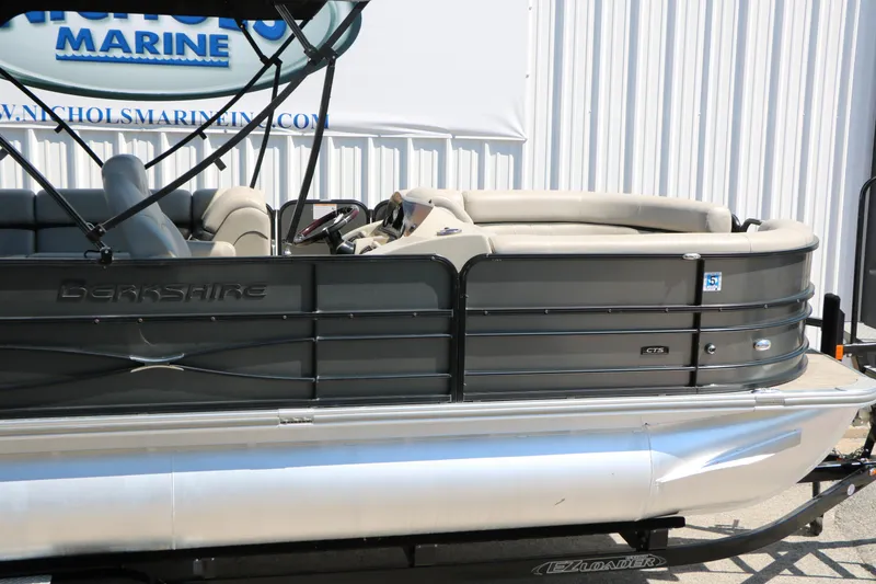 Slide: The Image of 2019 Berkshire 22CL CTS pontoon boat displayed at Nichols Marine dealership. - 9