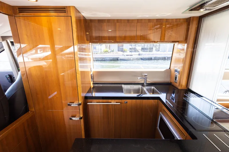 Slide: The Image of Luxurious kitchen on a 2014 Princess 64 Flybridge yacht. - 16