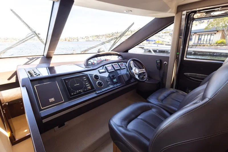 Slide: The Image of Helm station of Princess 64 Flybridge Yacht, 2014 model. - 22