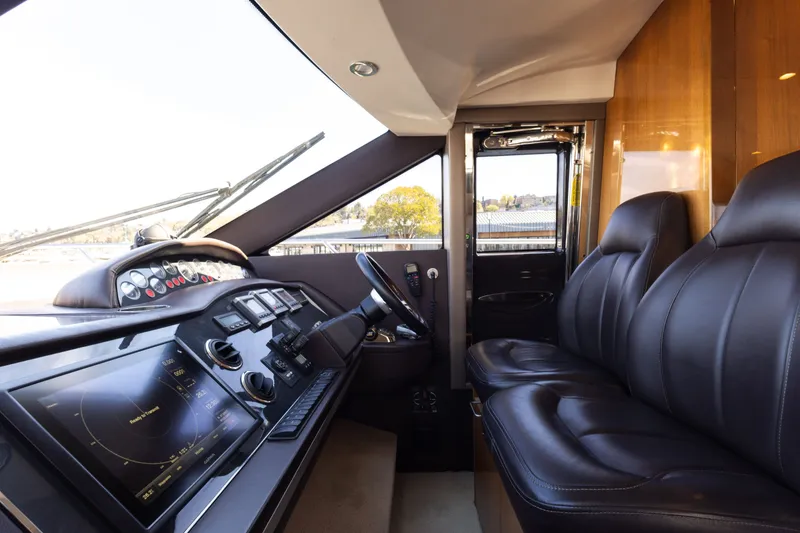 Slide: The Image of Interior of 2014 Princess 64 Flybridge Yacht with leather seating. - 26