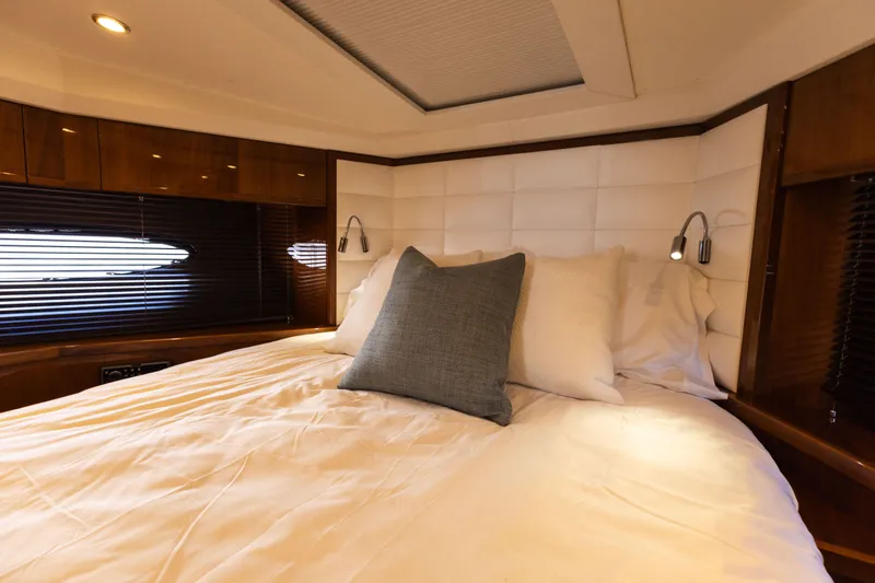 Slide: The Image of Luxurious bedroom on a 2014 Princess 64 Flybridge yacht. - 27