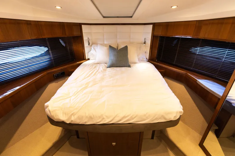 Slide: The Image of Luxurious bedroom on the 2014 Princess 64 Flybridge Yacht. - 28