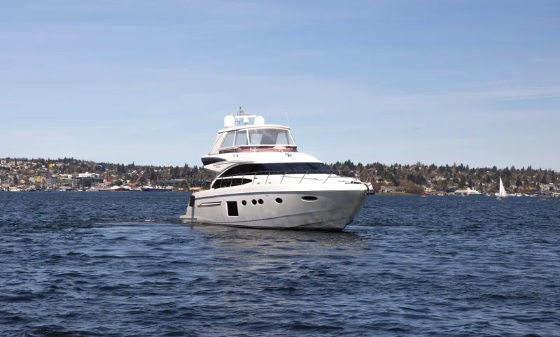 Slide: The Image of 2014 Princess 64 Flybridge Motor Yacht on the water. - 3