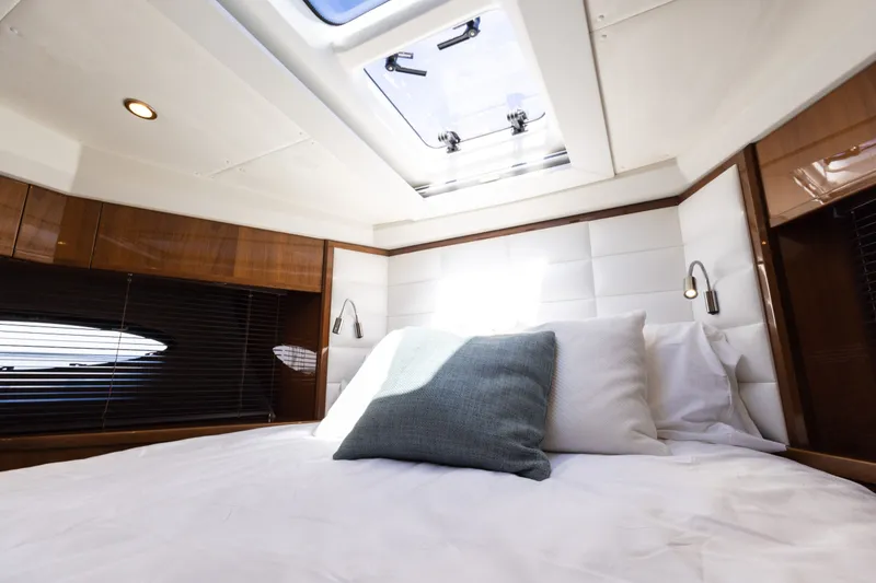 Slide: The Image of Luxurious bedroom on the 2014 Princess 64 Flybridge Yacht. - 34