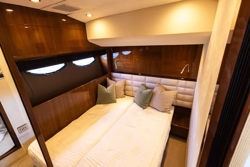 Slide: The Image of Luxurious bedroom in a 2014 Princess 64 Flybridge yacht. - 40
