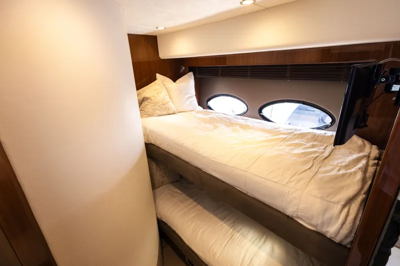 Slide: The Image of Interior of 2014 Princess 64 Flybridge Yacht with bunk beds. - 44