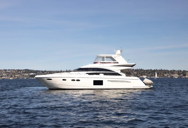 Slide: The Image of 2014 Princess 64 Flybridge Motor Yacht on calm waters. - 7