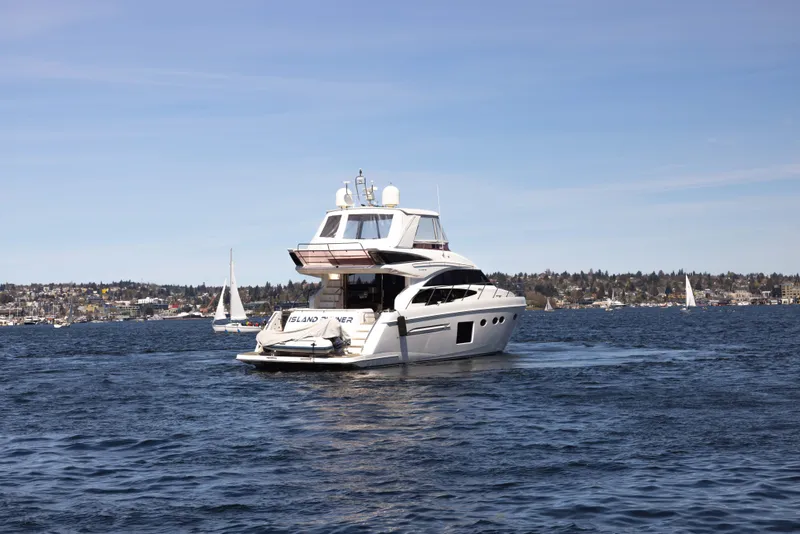 Slide: The Image of Princess 64 Flybridge Motor Yacht 2014 on open water. - 9