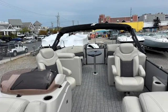 Slide: The Image of Dashboard of a 2021 Starcraft SLS 3 boat with gauges and controls. - 16