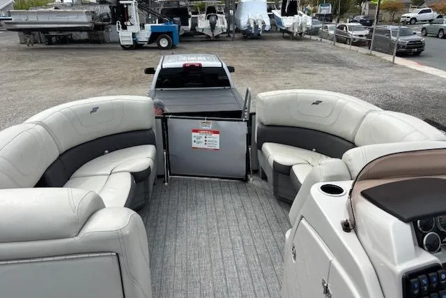 Slide: The Image of Storage compartment in 2021 Starcraft SLS 3 boat with black fenders and ropes. - 32