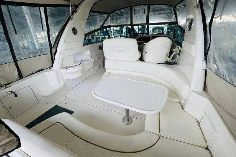 Slide: The Image of Interior of 2001 Sea Ray Sundancer 310 yacht with seating and table. - 19