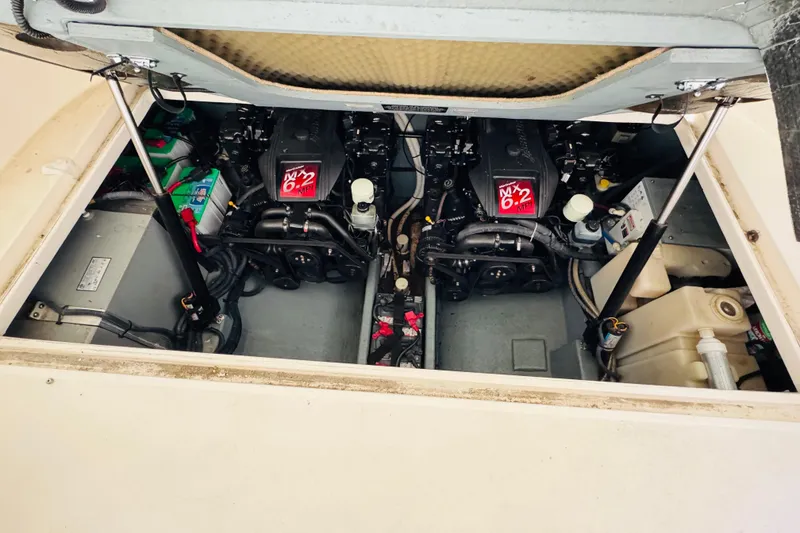 Slide: The Image of Engine compartment of a 2001 Sea Ray Sundancer 310 with twin MX 6.2 MPI engines. - 48