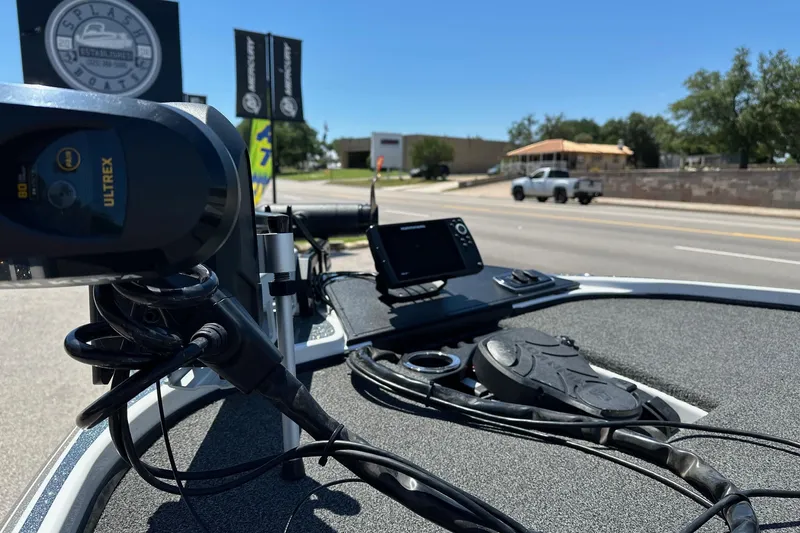 Slide: The Image of Boat dashboard with Ultrex motor and electronics, Nitro Z18 model, 2021, parked near road. - 10