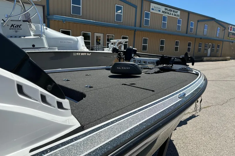Slide: The Image of 2021 Nitro Z18 boat at dealership, showcasing sleek design and modern features. - 7