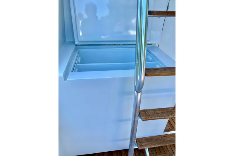 Slide: The Image of Refrigerator and ladder on 1986 Huckins Sport Fisherman. - 11