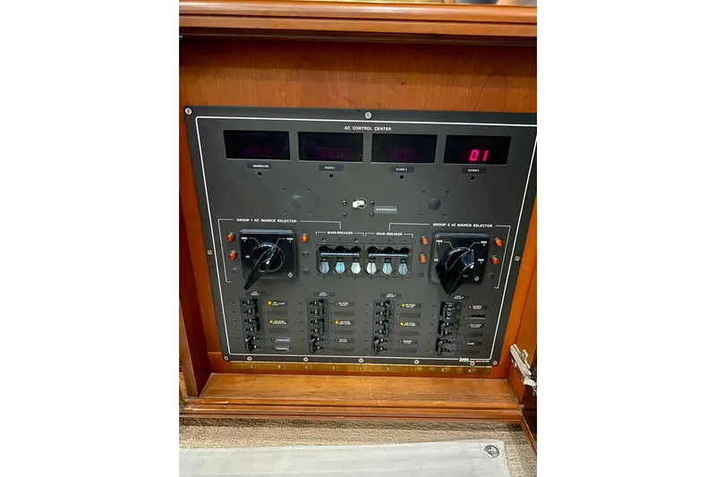 Slide: The Image of Electrical control panel on a 1986 Huckins Sport Fisherman boat. - 32