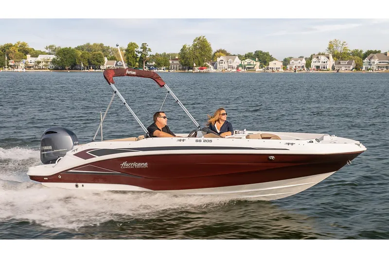 Slide: The Image of Manufacturer Provided Image: 2022 Hurricane SunDeck Sport 205 OB boat cruising on a lake. - 12