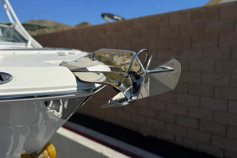 Slide: The Image of 2022 Robalo R247 Dual Console boat with stainless steel anchor detail. - 12