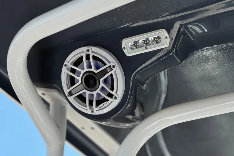 Slide: The Image of Speaker and LED lights on 2022 Robalo R247 Dual Console boat. - 19