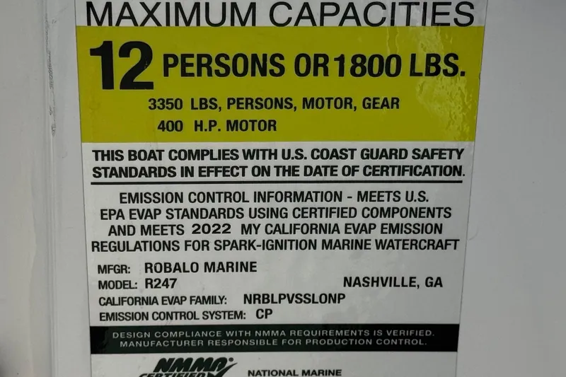 Slide: The Image of Capacity label for 2022 Robalo R247 Dual Console, 12 persons or 1800 lbs, 400 HP motor. - 49
