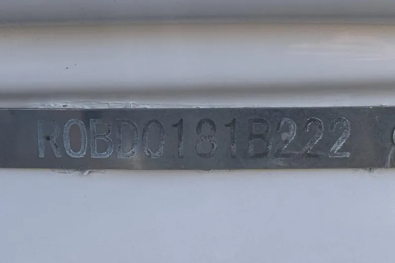 Slide: The Image of Hull identification number on a 2022 Robalo R247 Dual Console boat. - 50