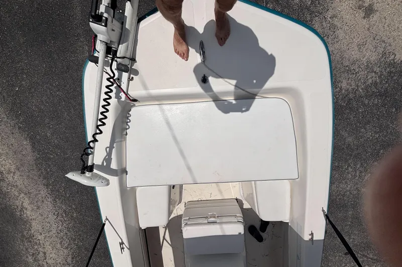 Slide: The Image of Overhead view of a 2008 Sundance B18CC boat deck with trolling motor. - 18