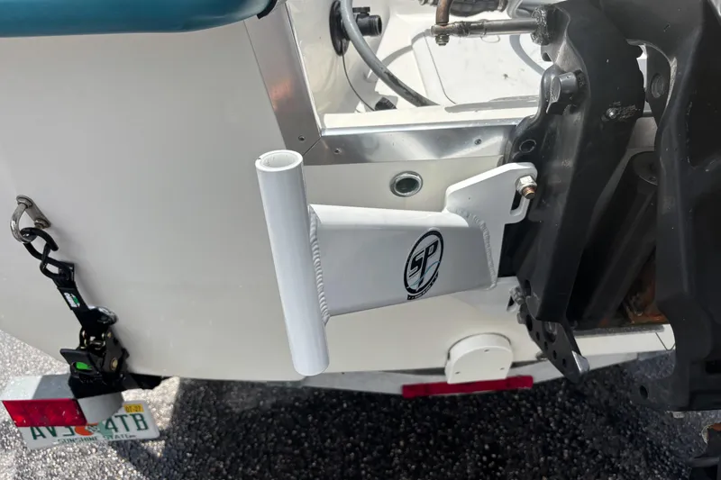 Slide: The Image of Rear view of a 2008 Sundance B18CC boat with a mounted accessory bracket. - 31