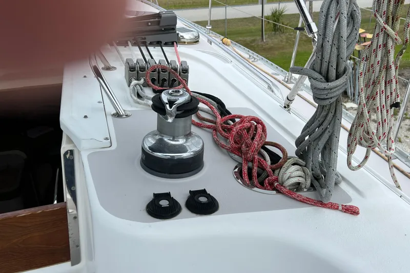 Slide: The Image of Deck of 2008 Catalina 470 sailboat with winch and coiled ropes. - 11