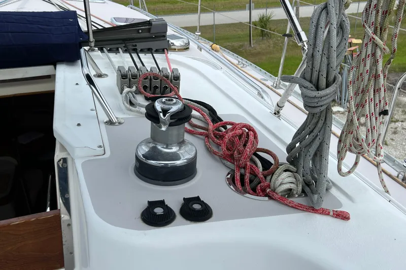 Slide: The Image of Deck of 2008 Catalina 470 sailboat with winch and coiled ropes. - 12