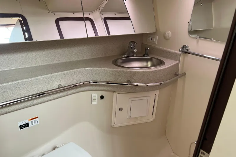 Slide: The Image of 2008 Catalina 470 yacht bathroom with sink, mirror, and countertop. - 30