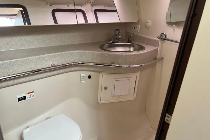 Slide: The Image of Bathroom interior of a 2008 Catalina 470 yacht, featuring a sink and toilet. - 31