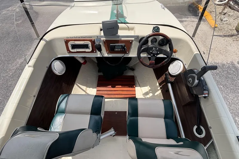 Slide: The Image of Interior of a 1966 Mohawk 15 boat with vintage steering and seating. - 35