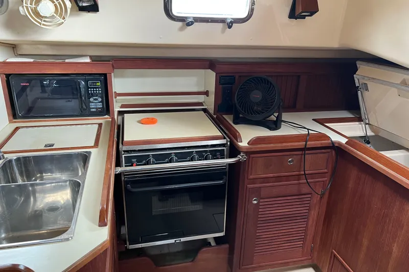 Slide: The Image of Galley of 2002 Island Packet 380 sailboat galley view - 10