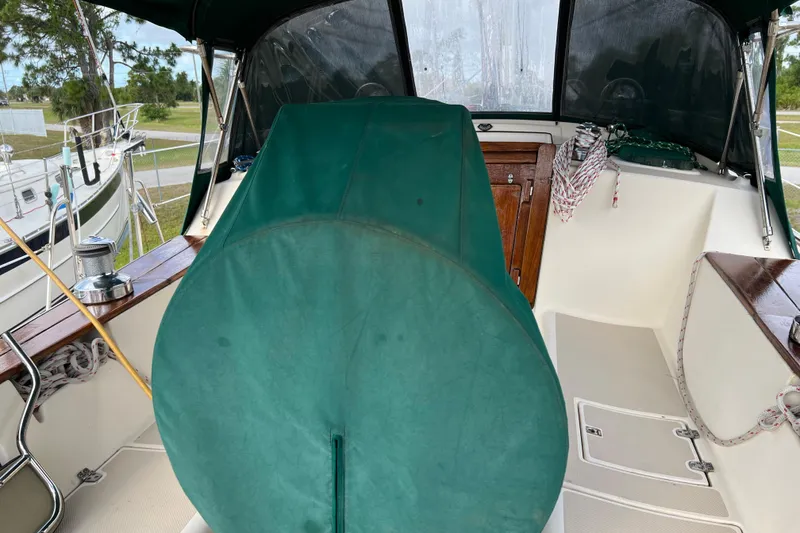 Slide: The Image of Cockpit of 2002 Island Packet 380 sailboat cockpit. Full Helm cover - 4