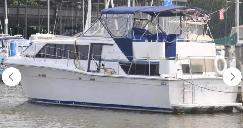 The Image of 1988 Chris-Craft 381 Catalina yacht docked in harbor. - 0