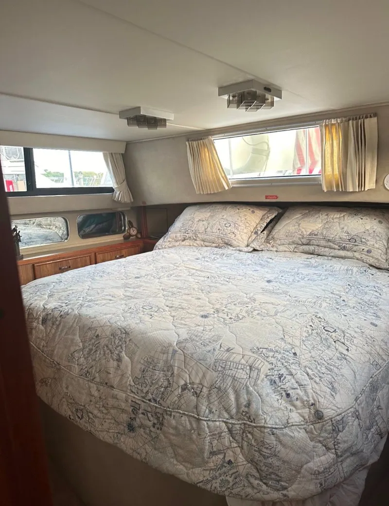 Slide: The Image of Interior of 1988 Chris-Craft 381 Catalina with cozy bed. - 10