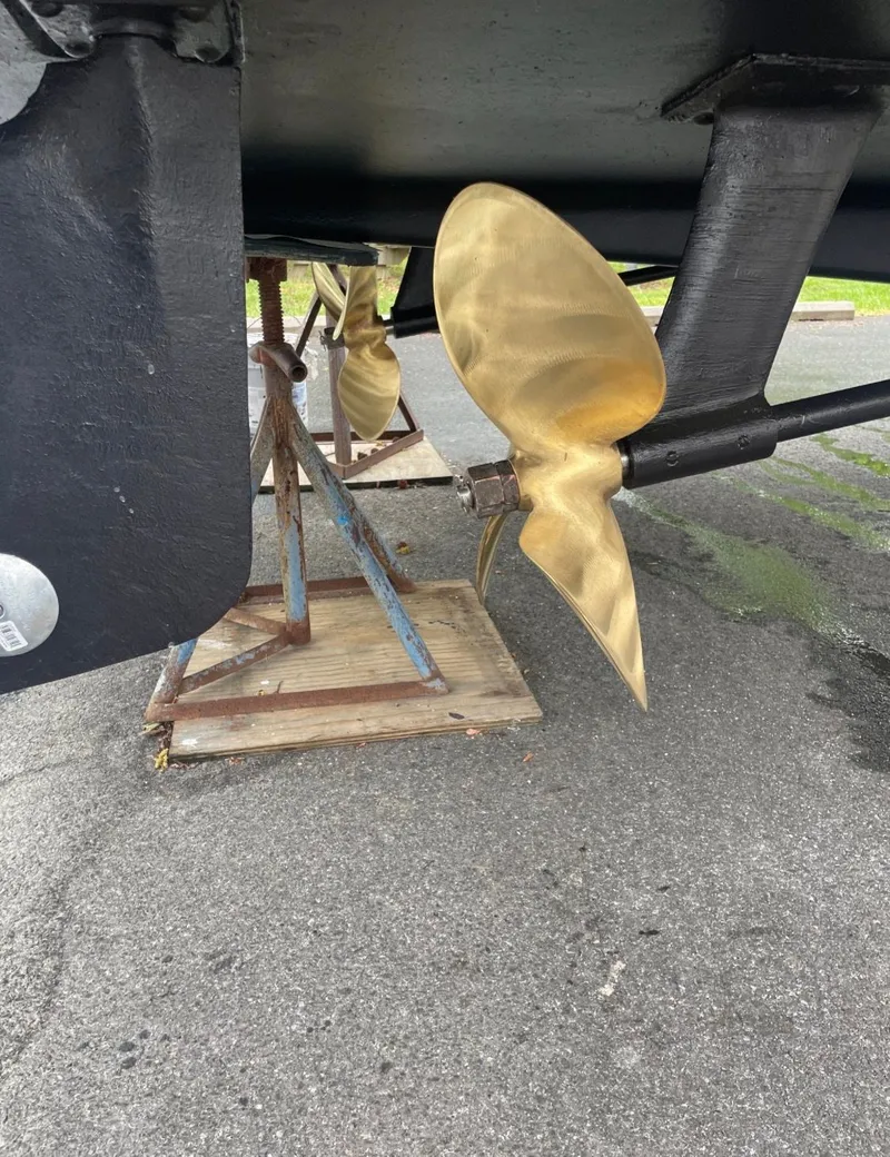 Slide: The Image of Propeller of a 1988 Chris-Craft 381 Catalina boat on a stand. - 19