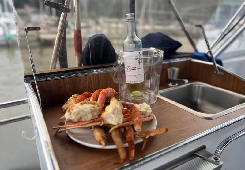 Slide: The Image of Crabs and wine on Chris-Craft 381 Catalina, 1988. - 4