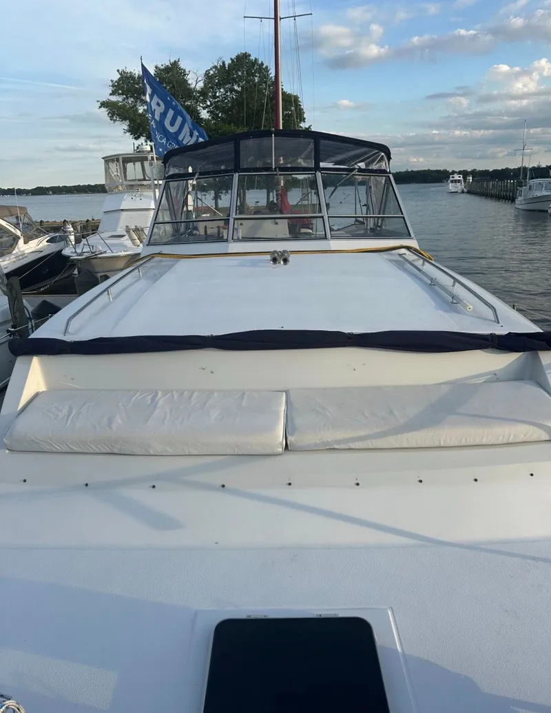Slide: The Image of 1988 Chris-Craft 381 Catalina yacht docked at harbor. - 5