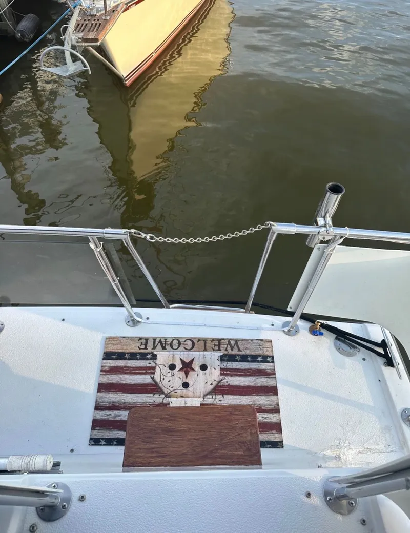 Slide: The Image of Stern view of 1988 Chris-Craft 381 Catalina with welcome sign. - 9